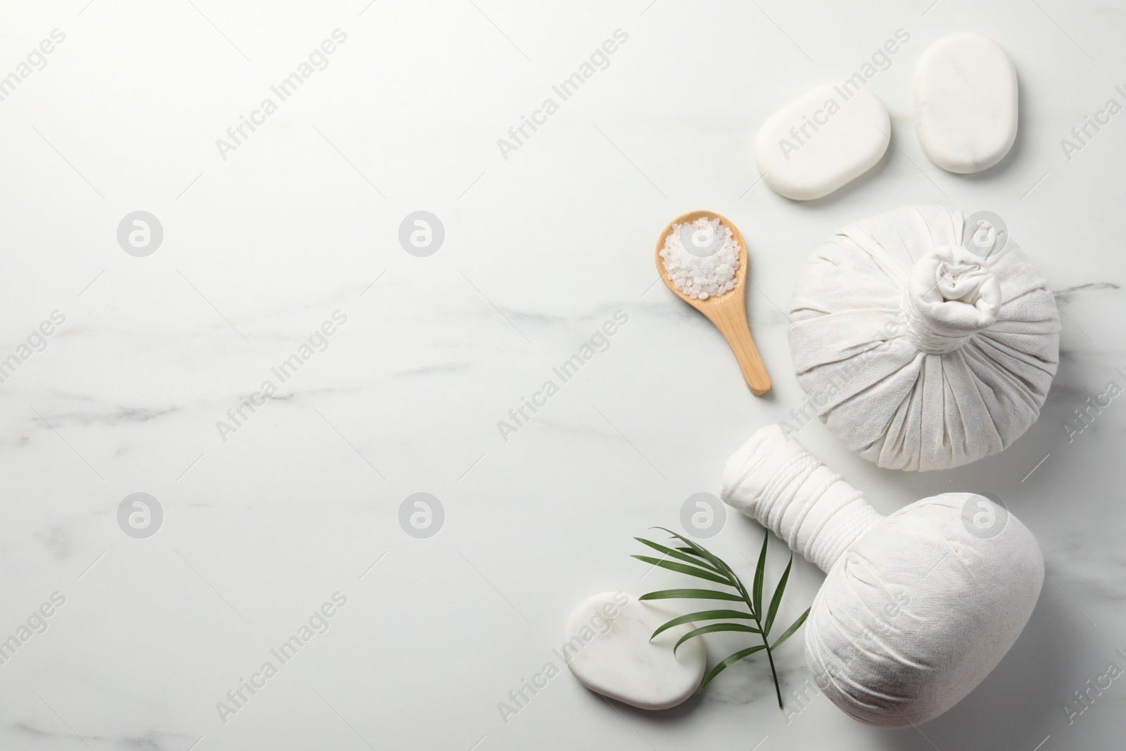 Photo of Flat lay composition with different spa products on white marble table. Space for text