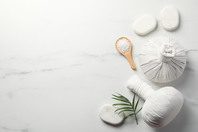 Photo of Flat lay composition with different spa products on white marble table. Space for text