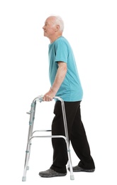 Full length portrait of elderly man using walking frame isolated on white