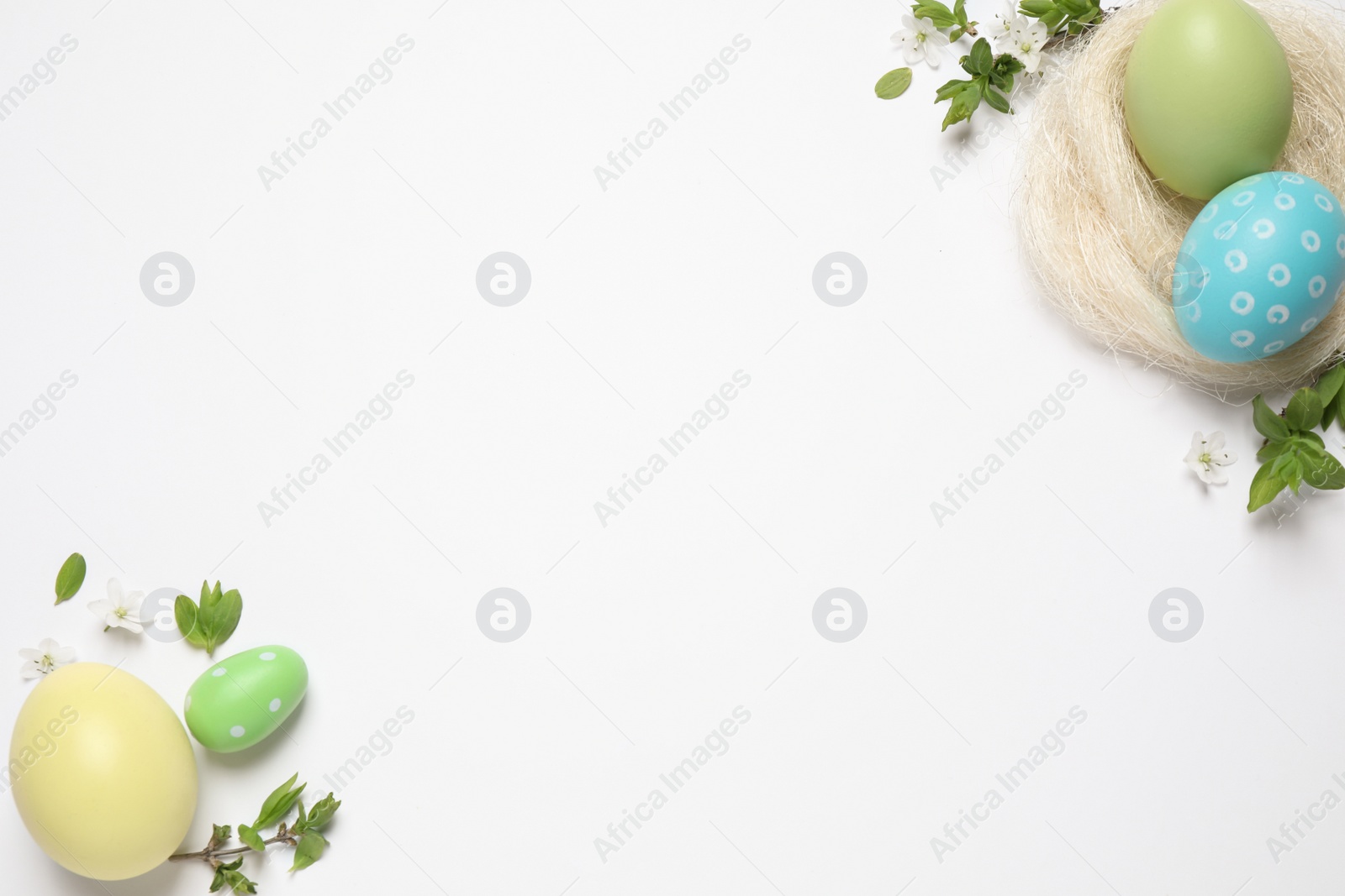 Photo of Frame made with Easter eggs on white background, flat lay. Space for text