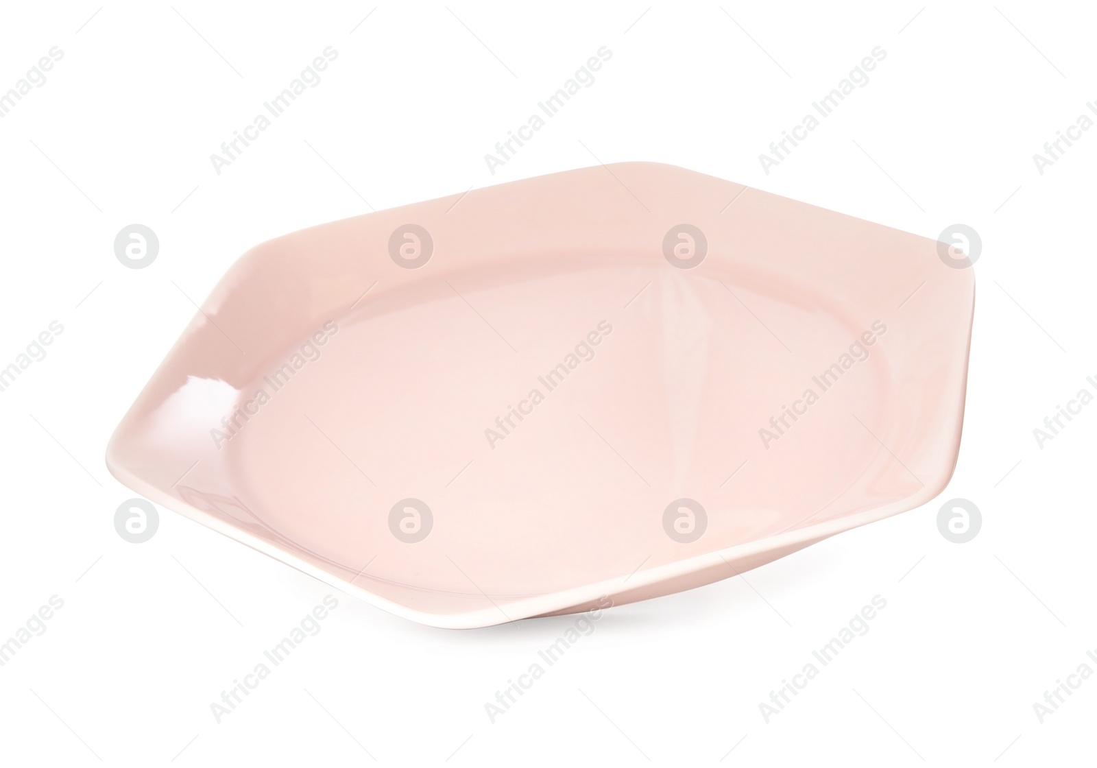 Photo of Clean light pink plate isolated on white