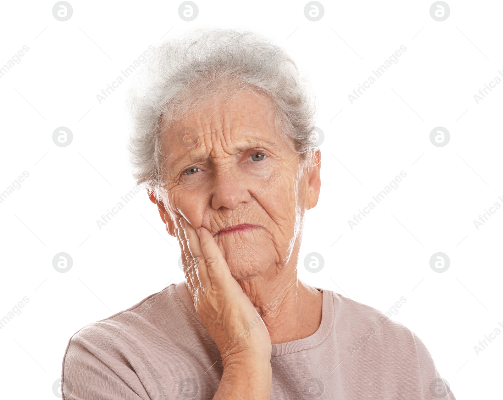 Photo of Senior woman suffering from toothache on white background