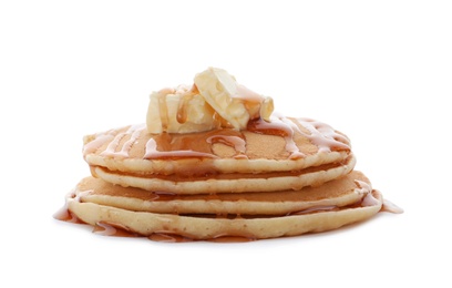 Tasty pancakes with honey and butter on white background