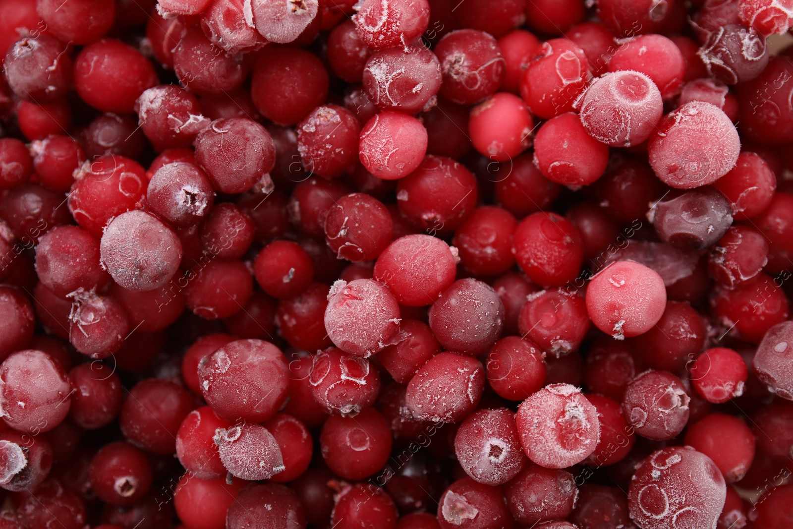 Photo of Frozen red cranberries as background, top view