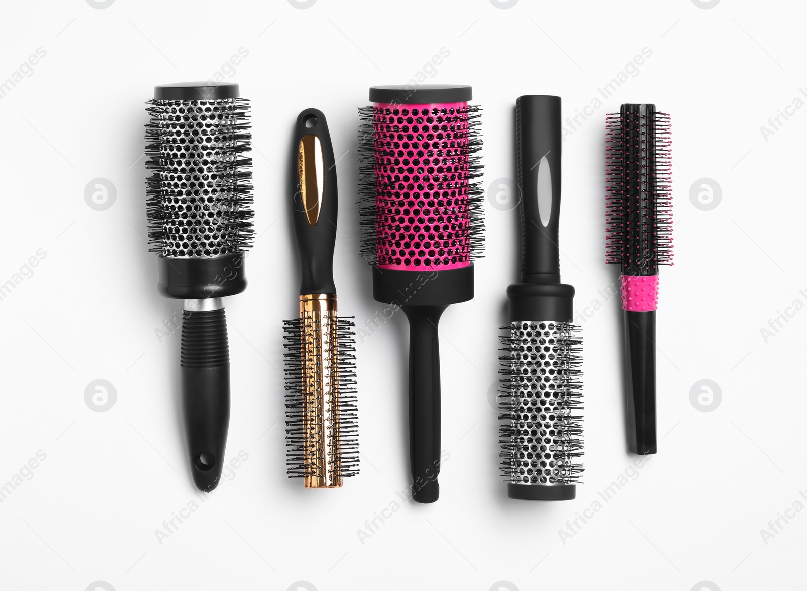 Photo of Composition with round hair brushes on white background, top view