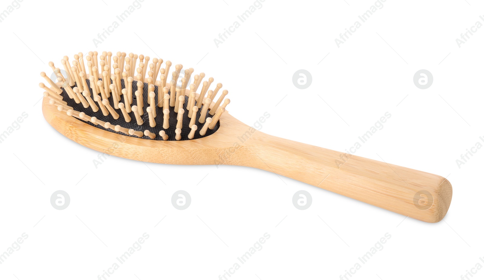 Photo of One new wooden hairbrush isolated on white