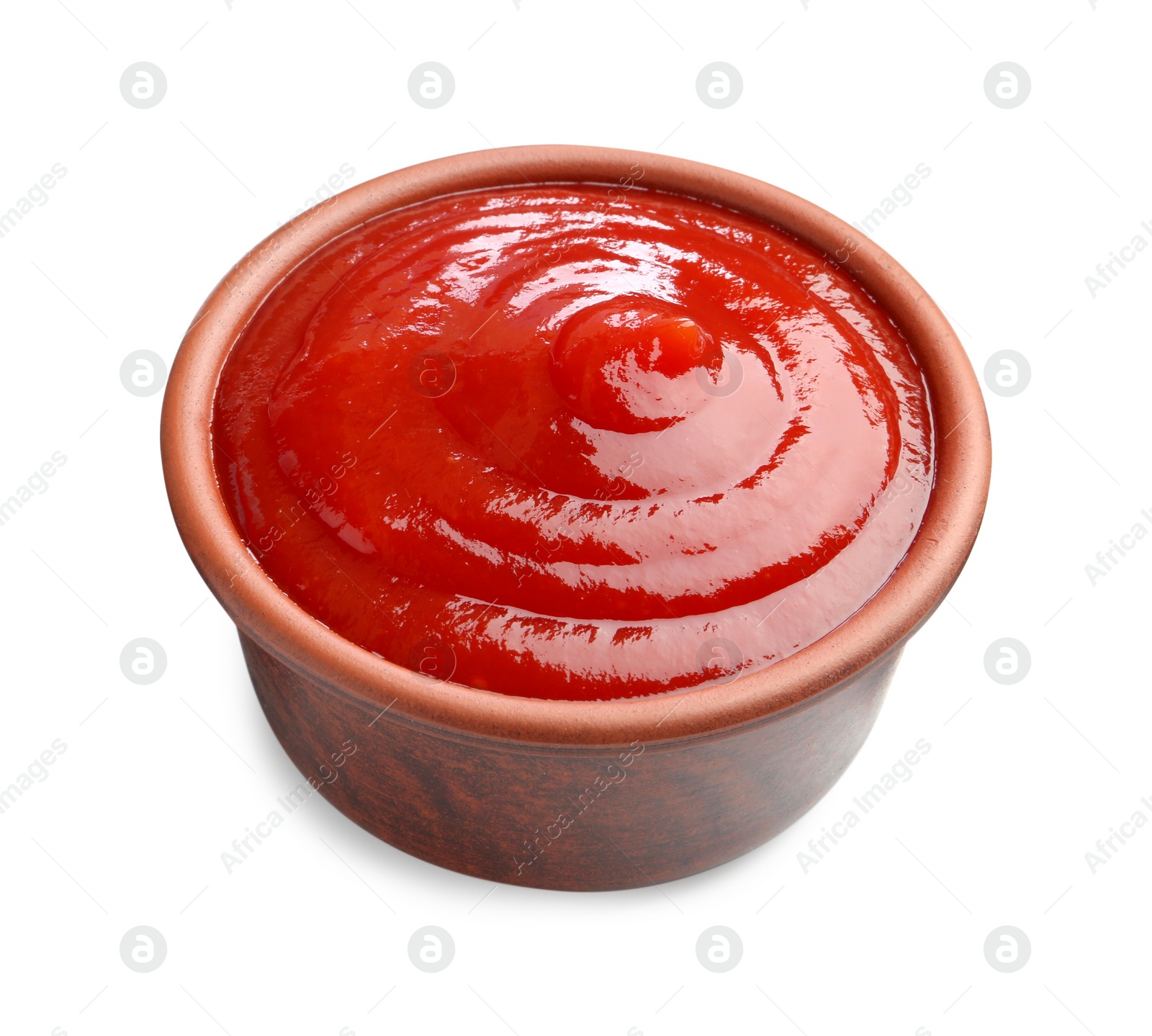 Photo of Tasty ketchup in bowl isolated on white. Tomato sauce