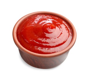 Photo of Tasty ketchup in bowl isolated on white. Tomato sauce