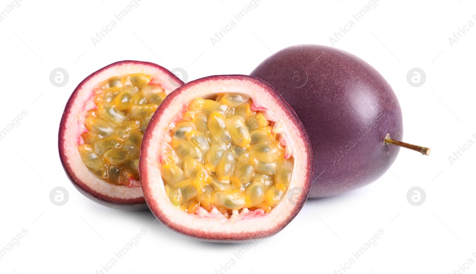 Photo of Cut and whole passion fruits isolated on white