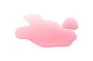 Puddle of red liquid on white background