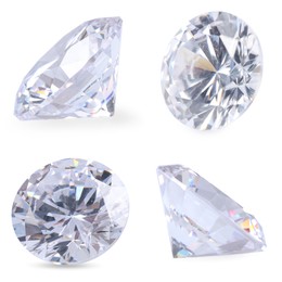 Beautiful dazzling diamonds on white background, set