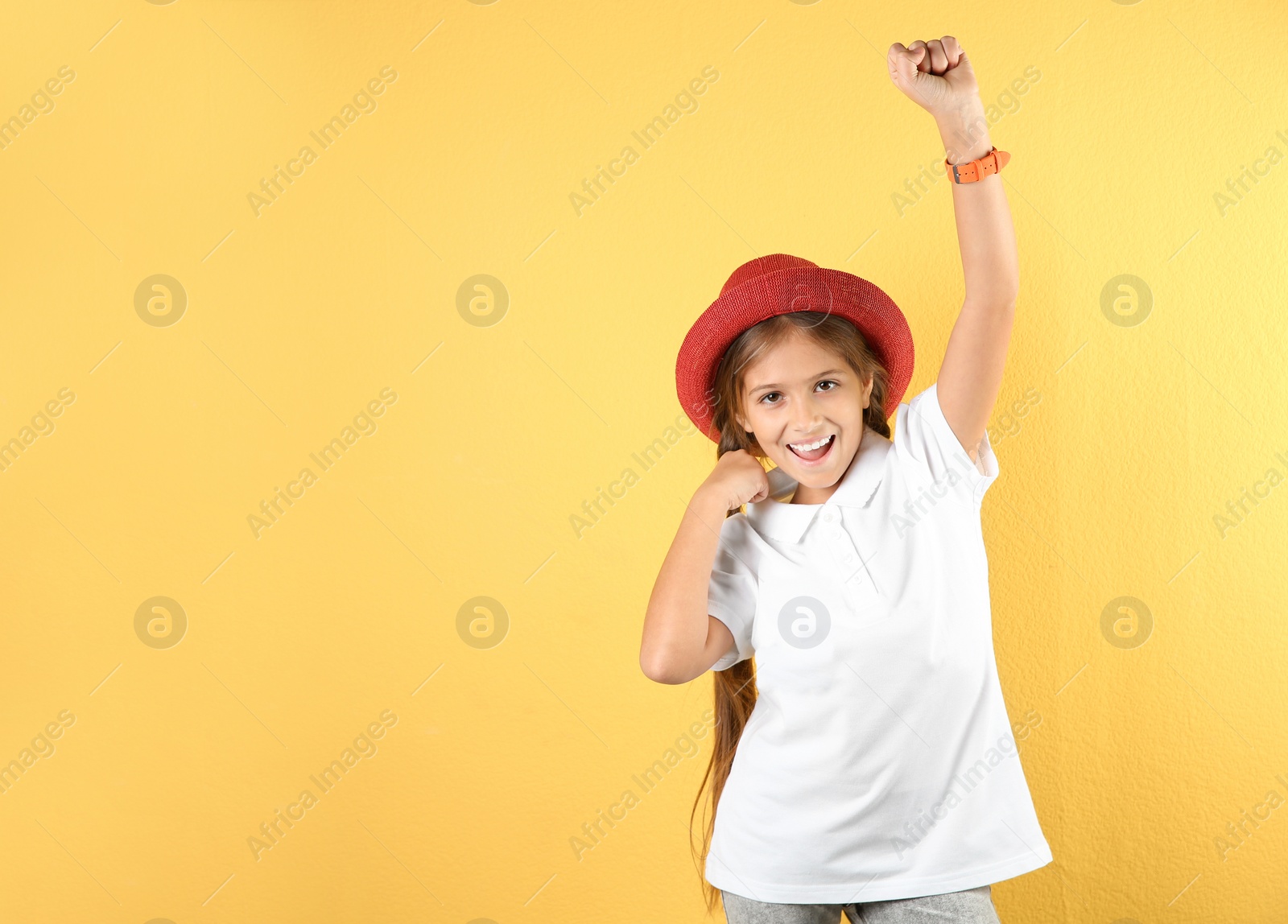 Photo of Portrait of emotional preteen girl against color background. Space for text