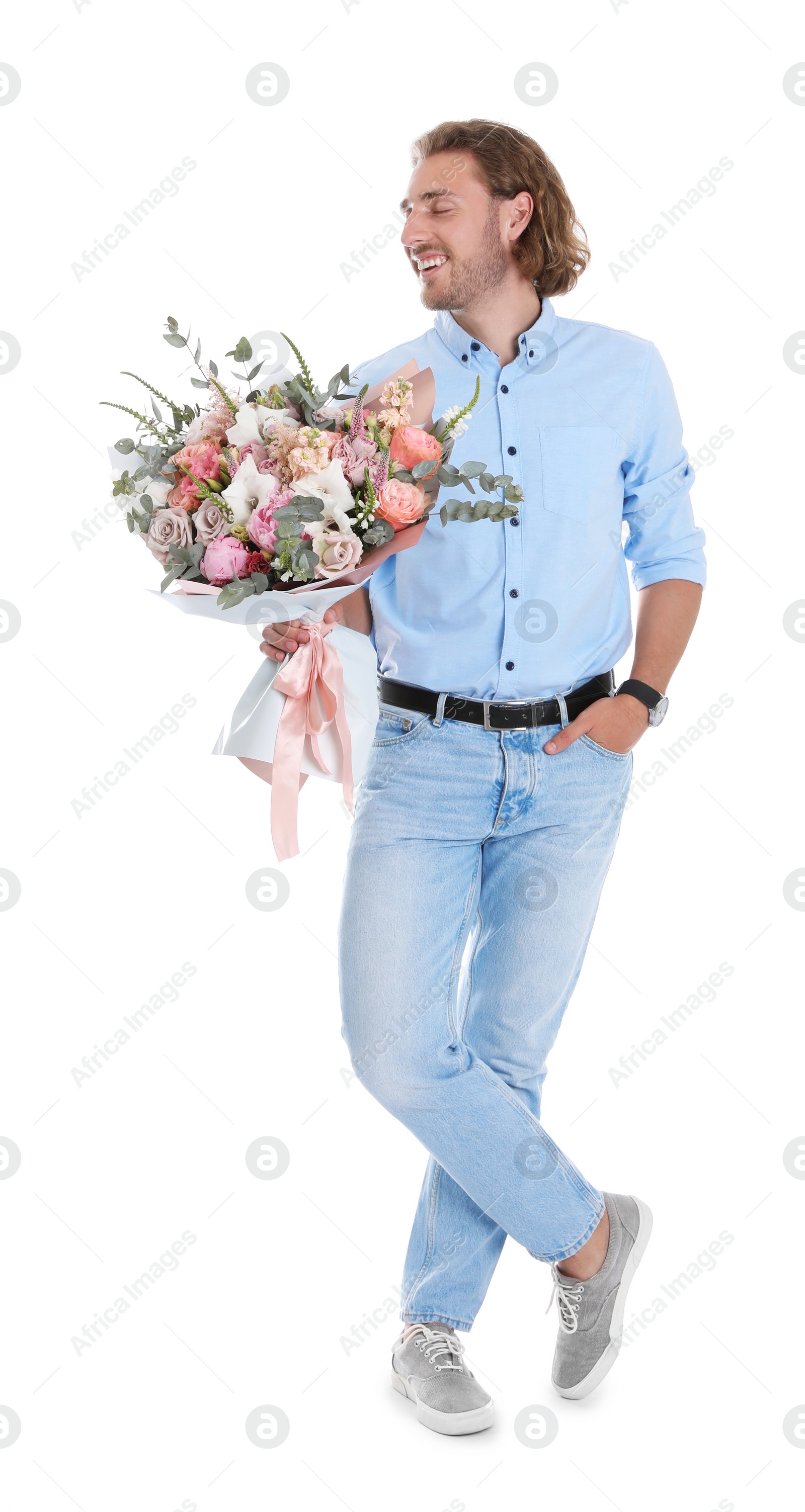 Photo of Young handsome man with beautiful flower bouquet on white background