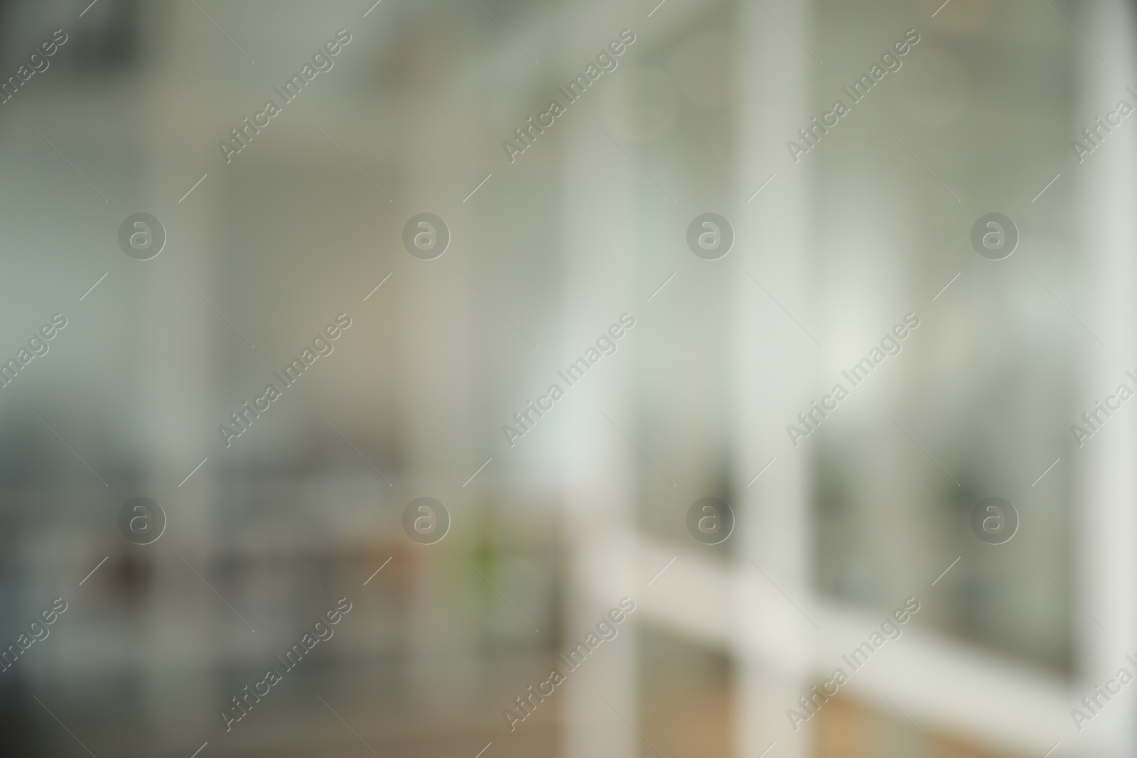 Photo of Blurred view of empty corridor in company