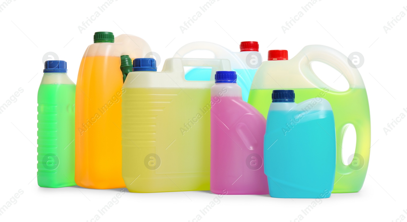 Photo of Plastic canisters with different liquids for car on white background