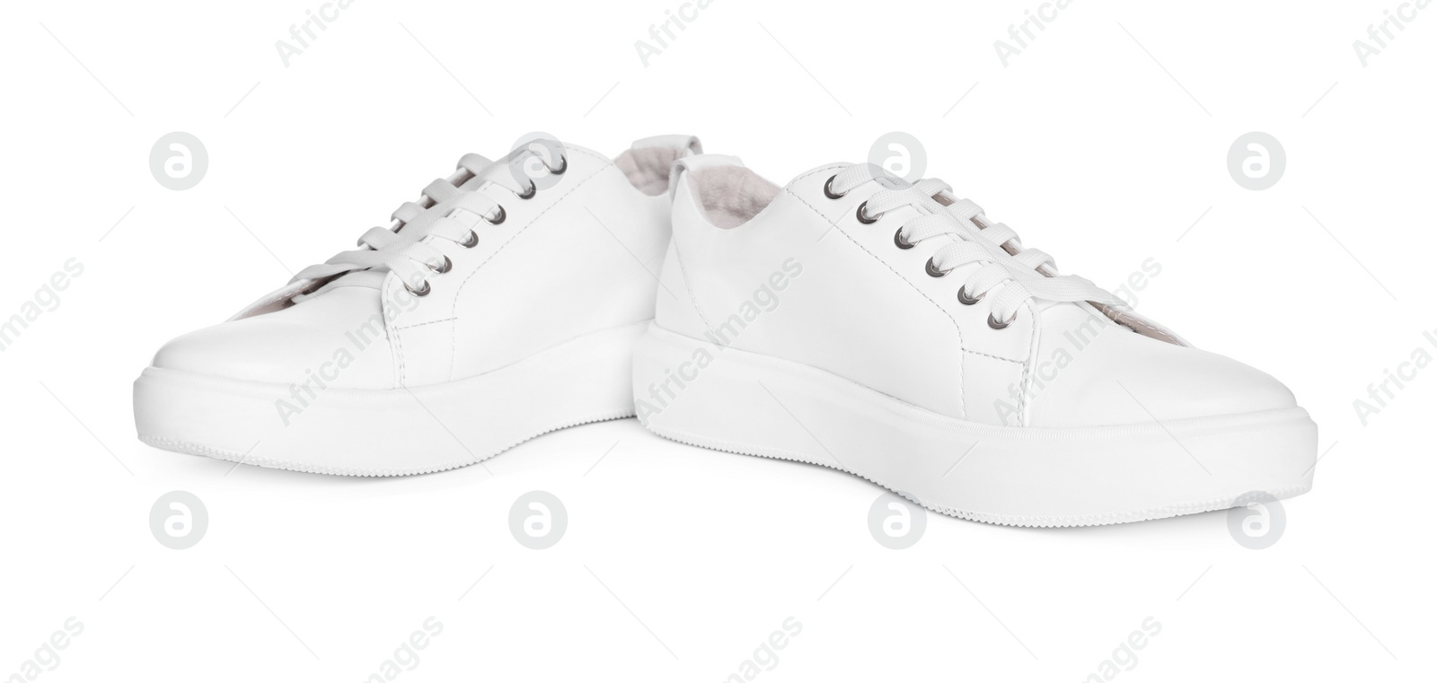 Photo of Pair of stylish sneakers isolated on white