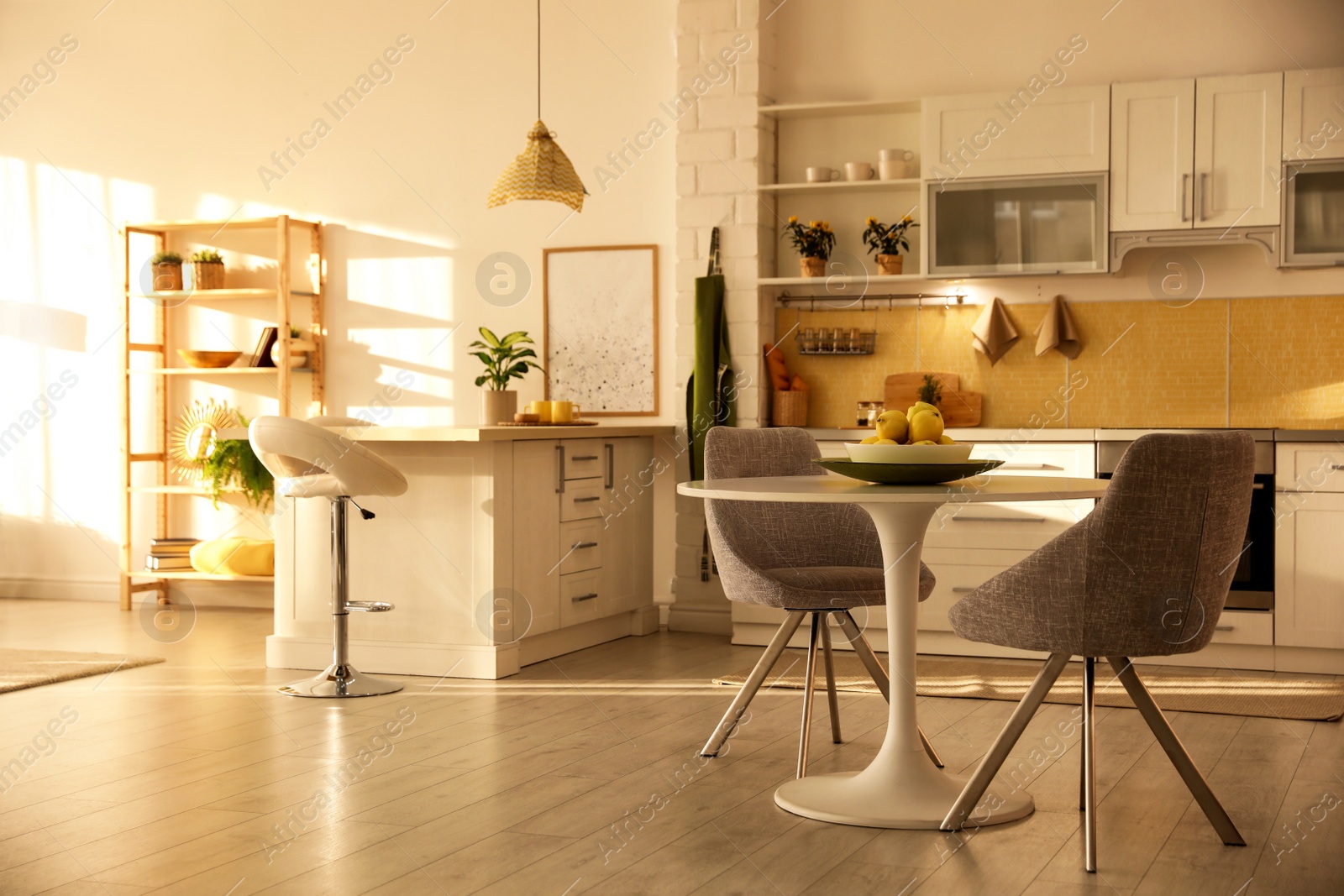 Photo of Modern kitchen interior with stylish white furniture