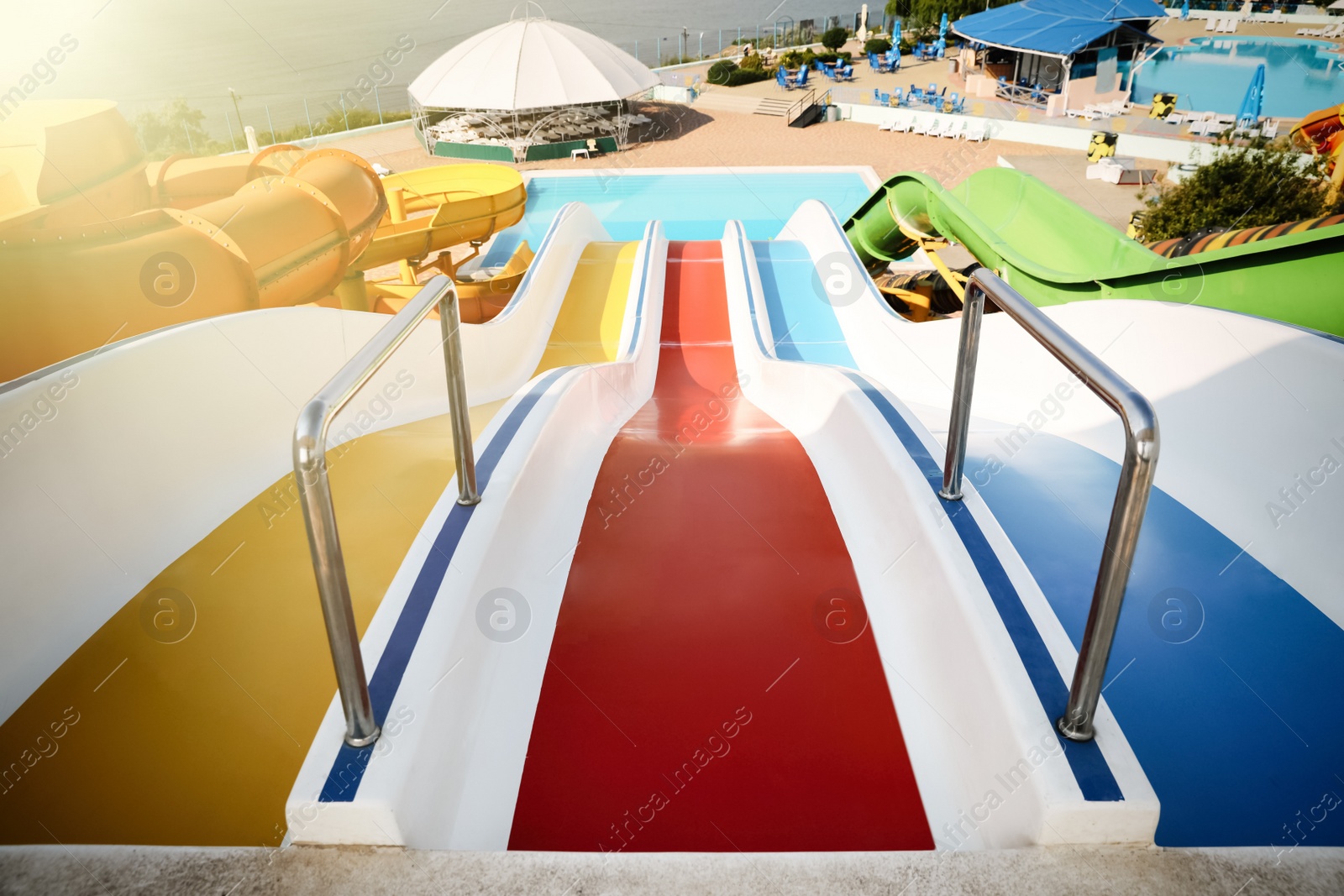 Photo of Colorful slides in water park on sunny day