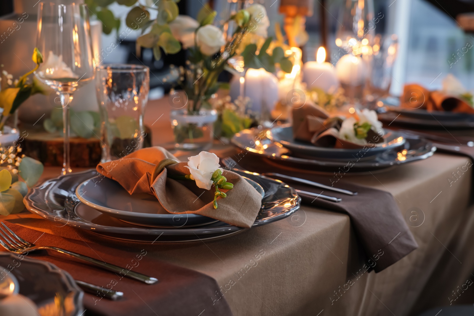 Photo of Elegant table setting with beautiful floral decor