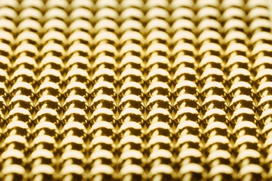 Image of Small golden magnetic balls as background, closeup