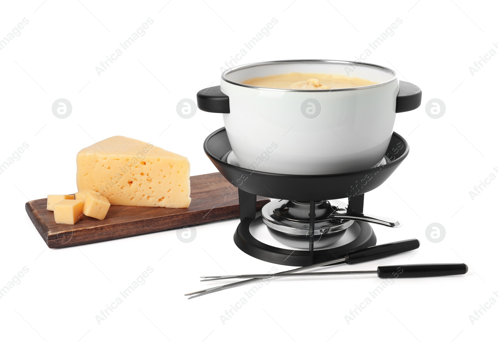 Photo of Fondue with tasty melted cheese, forks and pieces isolated on white