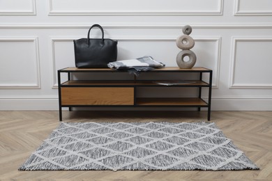 Photo of Modern hallway interior with furniture and rug