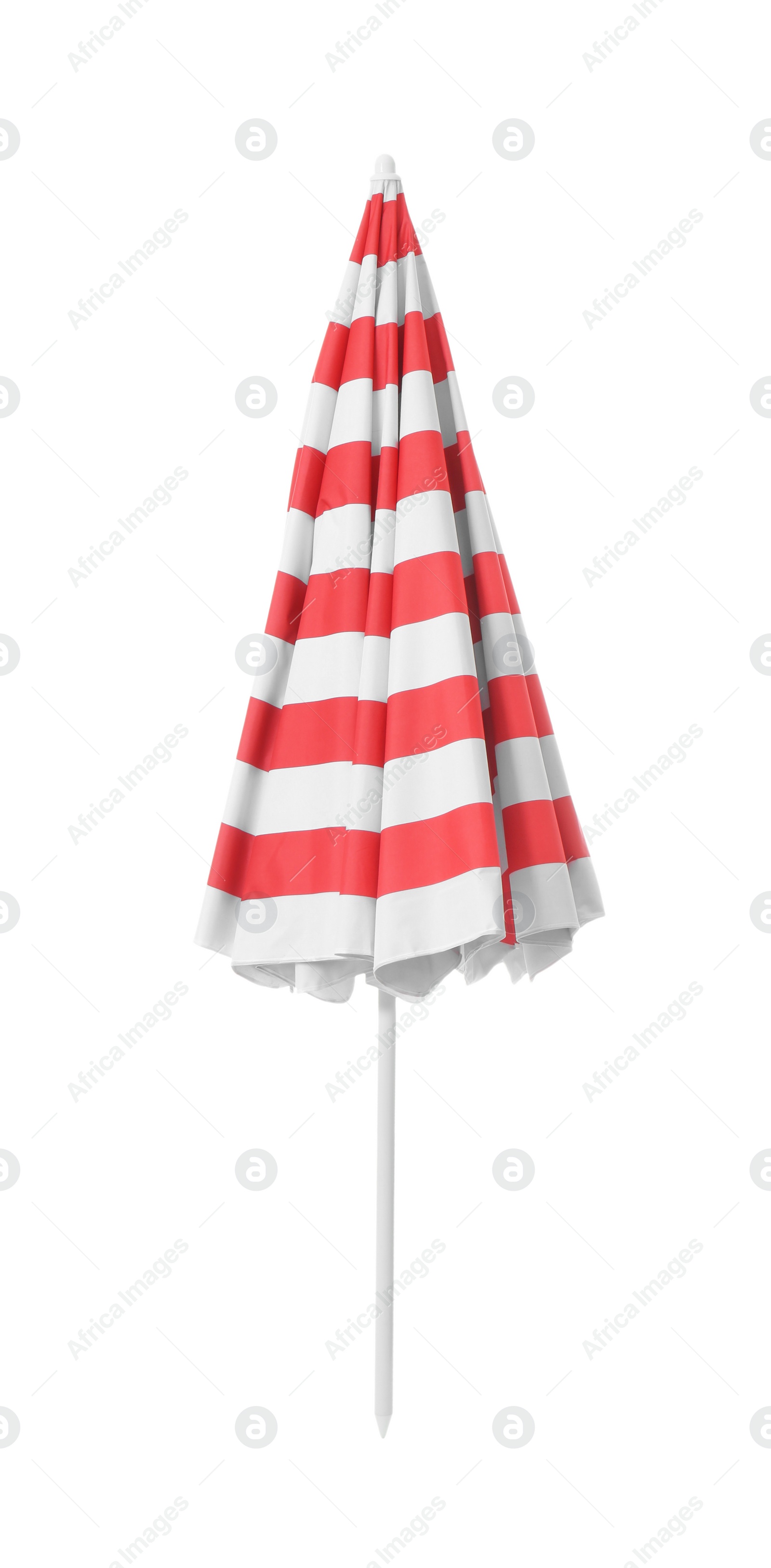 Photo of Closed red striped beach umbrella isolated on white
