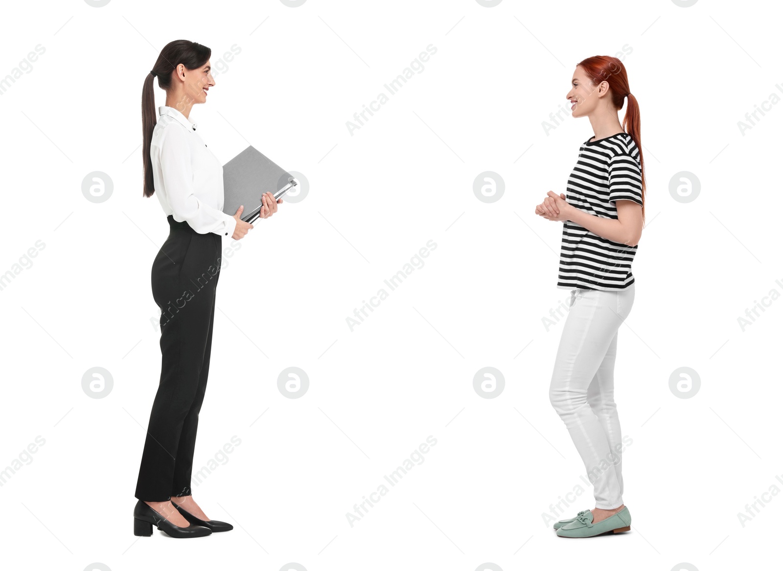 Image of Dialogue. Two women talking on white background