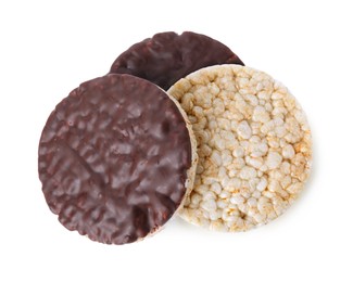 Photo of Puffed rice cakes with chocolate spread isolated on white, top view