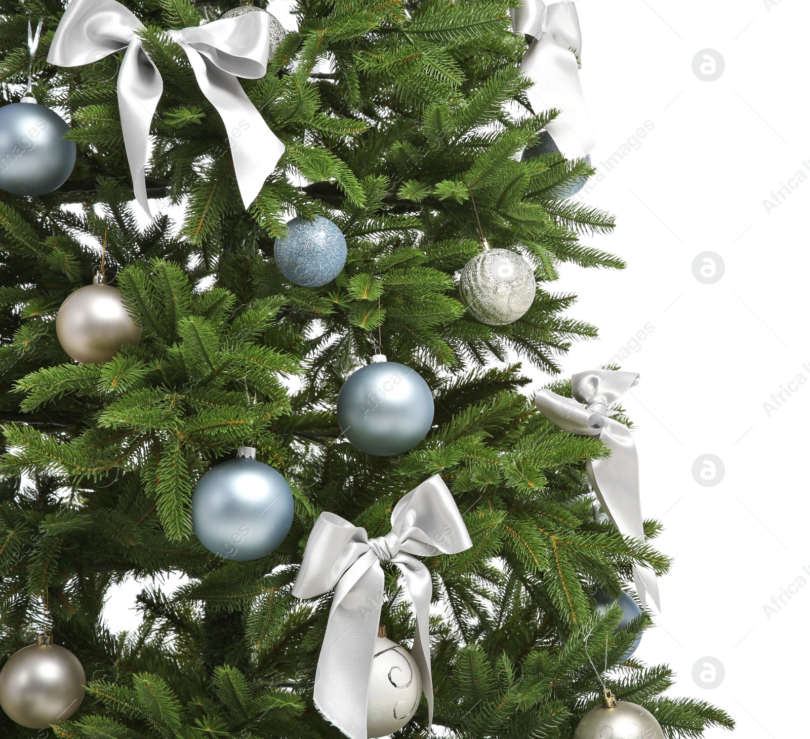 Photo of Beautifully decorated Christmas tree on white background, closeup