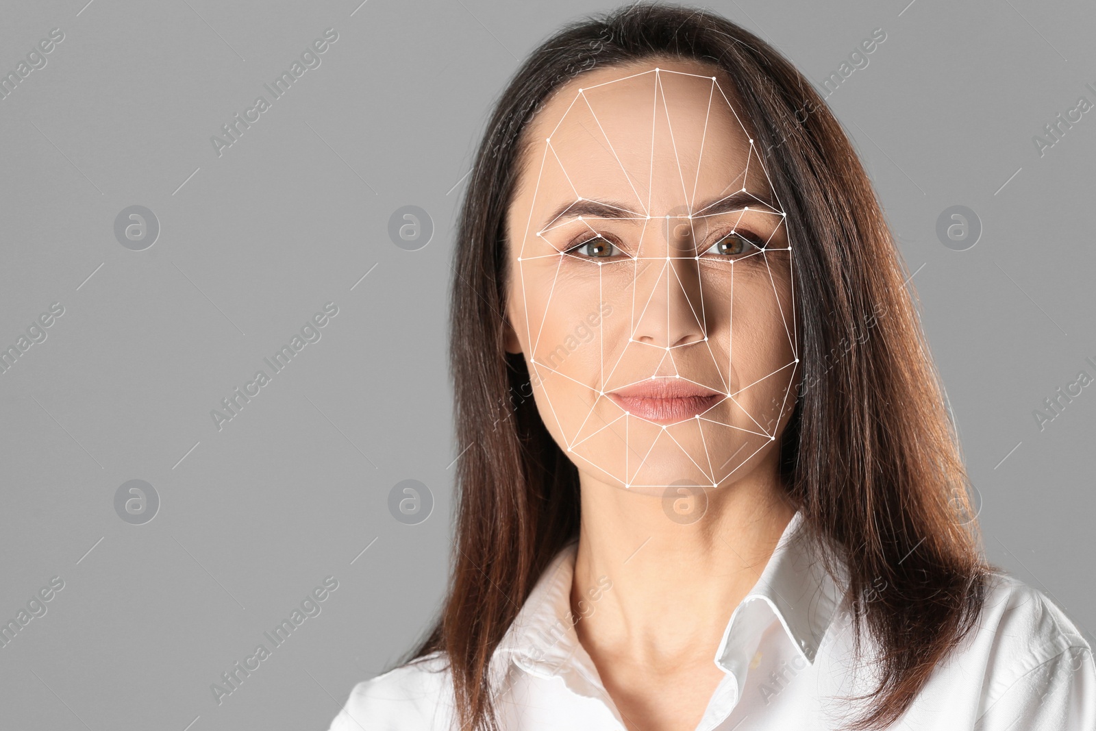 Image of Facial recognition system. Mature woman with biometric identification scanning grid on grey background