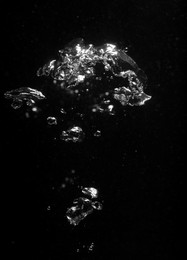 Photo of Air bubbles in water on black background