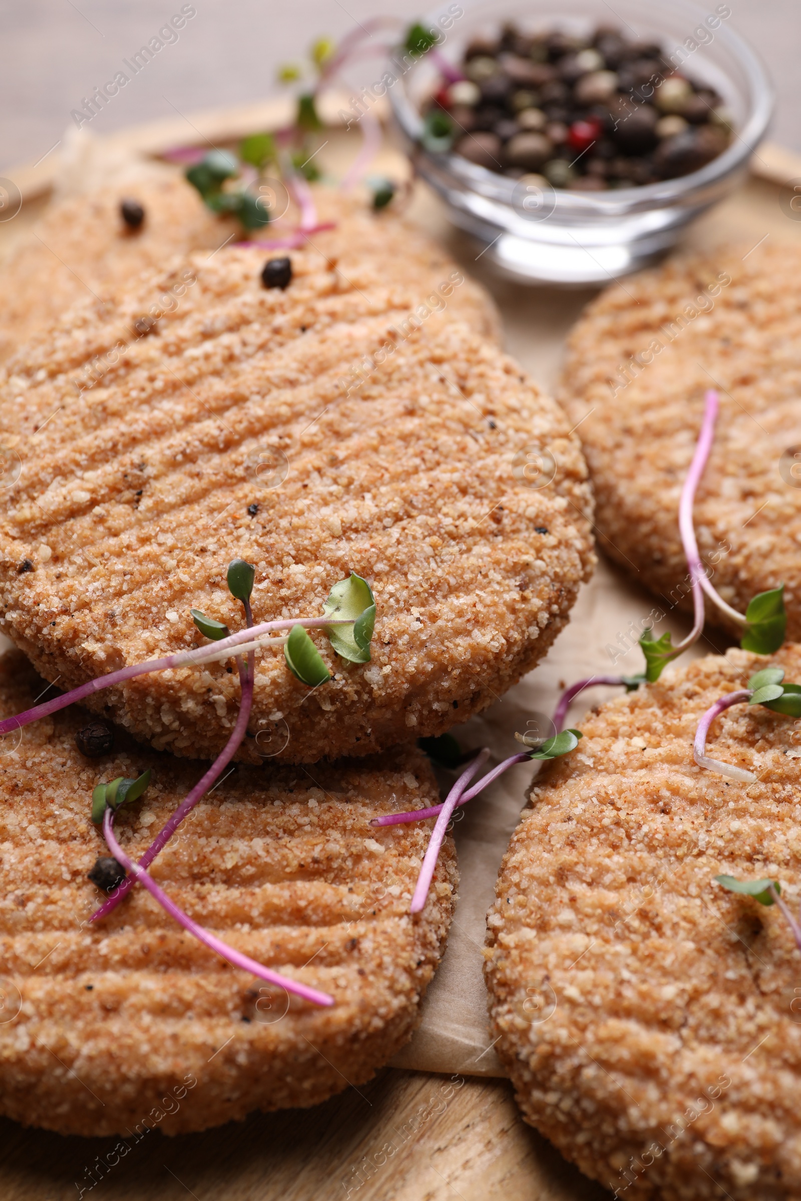 Photo of Tasty vegan cutlets with breadcrumbs on table, closeup