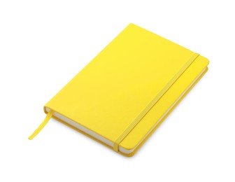 Closed yellow office notebook isolated on white