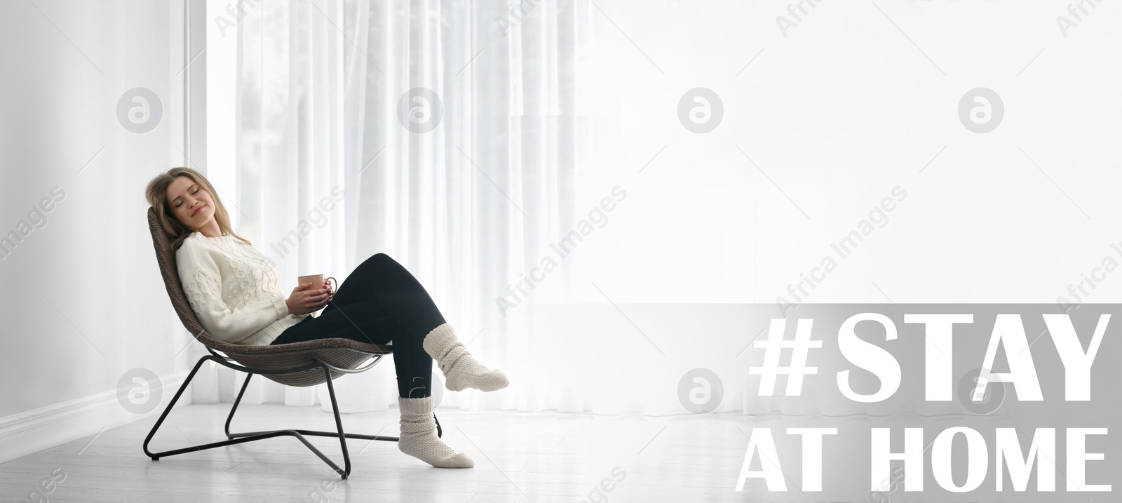 Image of Hashtag Stay At Home - protective measure during coronavirus pandemic, banner design. Young woman resting in armchair near window