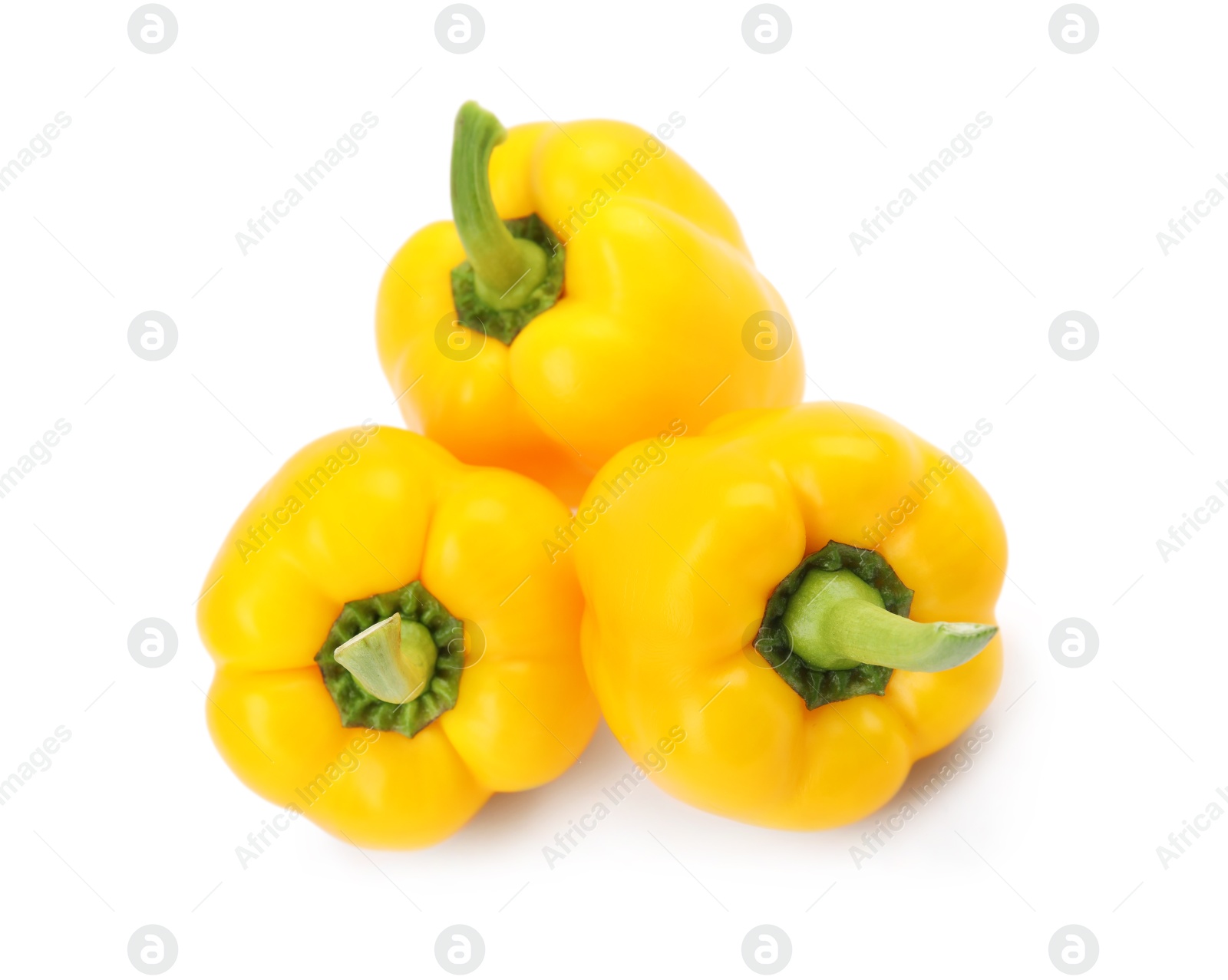 Photo of Ripe yellow bell peppers isolated on white