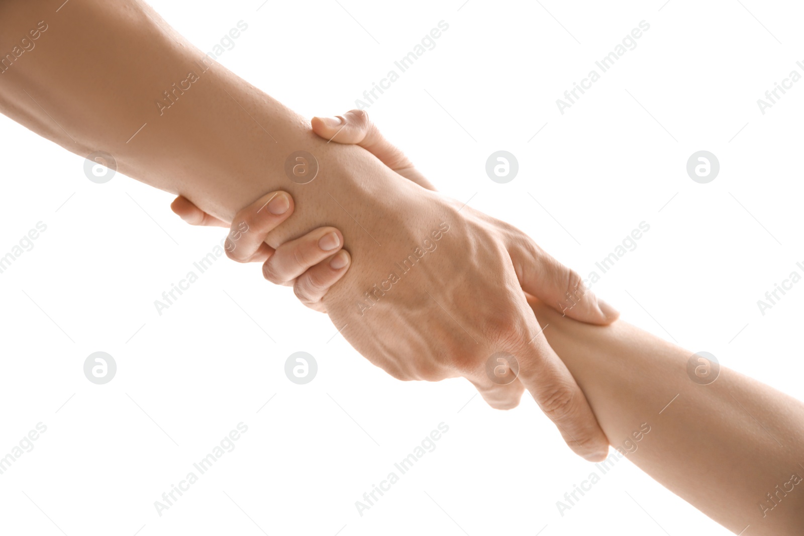 Photo of Man and woman holding hands together on light background. Unity concept