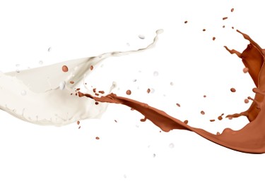 Image of Splashes of chocolate milk and ordinary one mixing together on white background