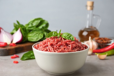 Photo of Fresh raw minced meat on light table