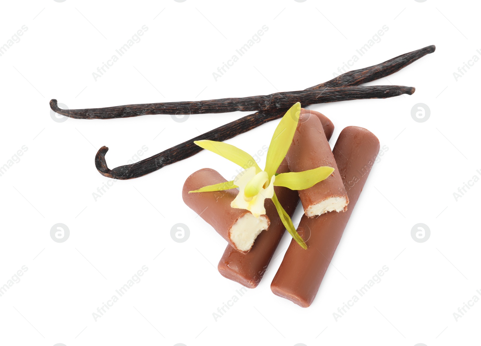 Photo of Glazed curd cheese bars, vanilla pods and flower isolated on white, top view