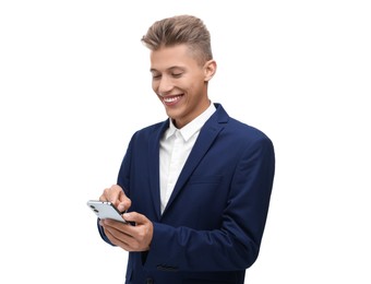 Happy young man sending message via smartphone on white background