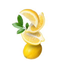 Image of Cut and whole fresh lemons with green leaves isolated on white