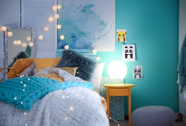 Cozy room interior with comfortable bed