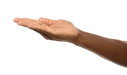 African-American man holding something in hand on white background, closeup