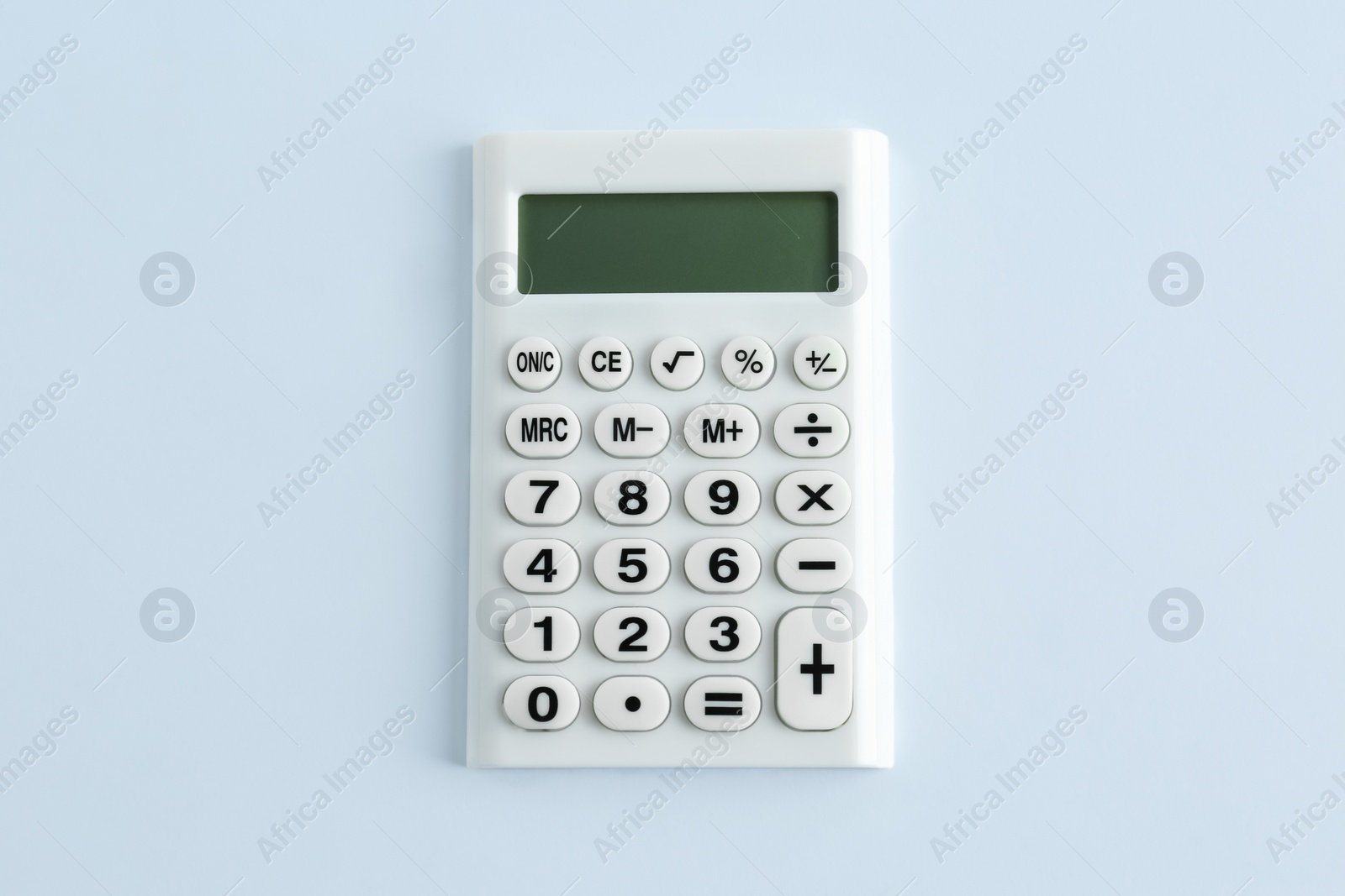 Photo of Modern calculator on white background, top view