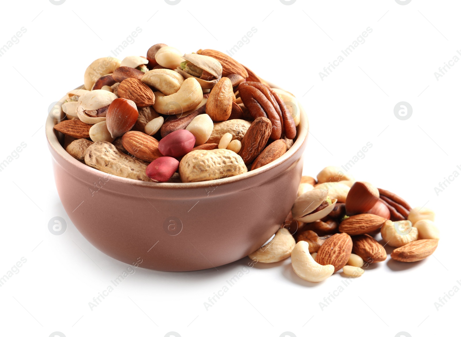 Photo of Bowl with mixed organic nuts on white background