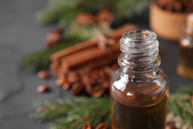 Photo of Bottle of anise essential oil, closeup. Space for text