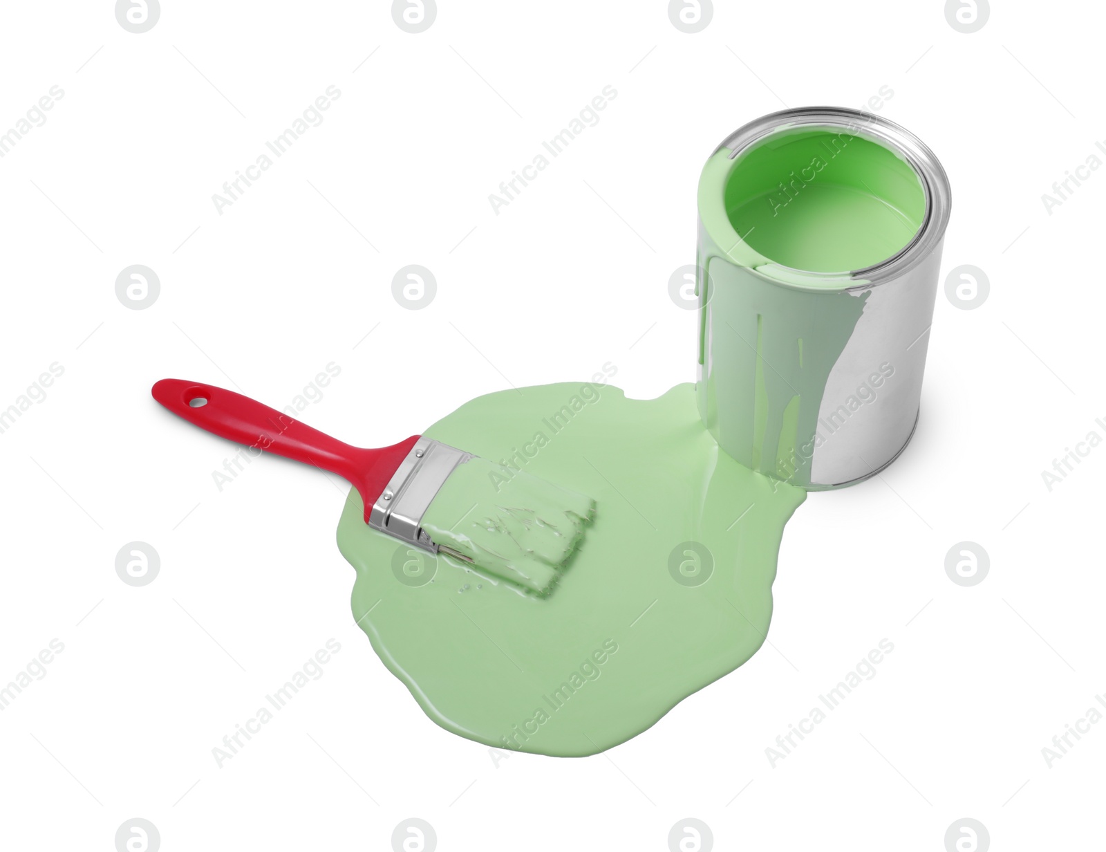 Photo of Spilled paint, brush and can on white background