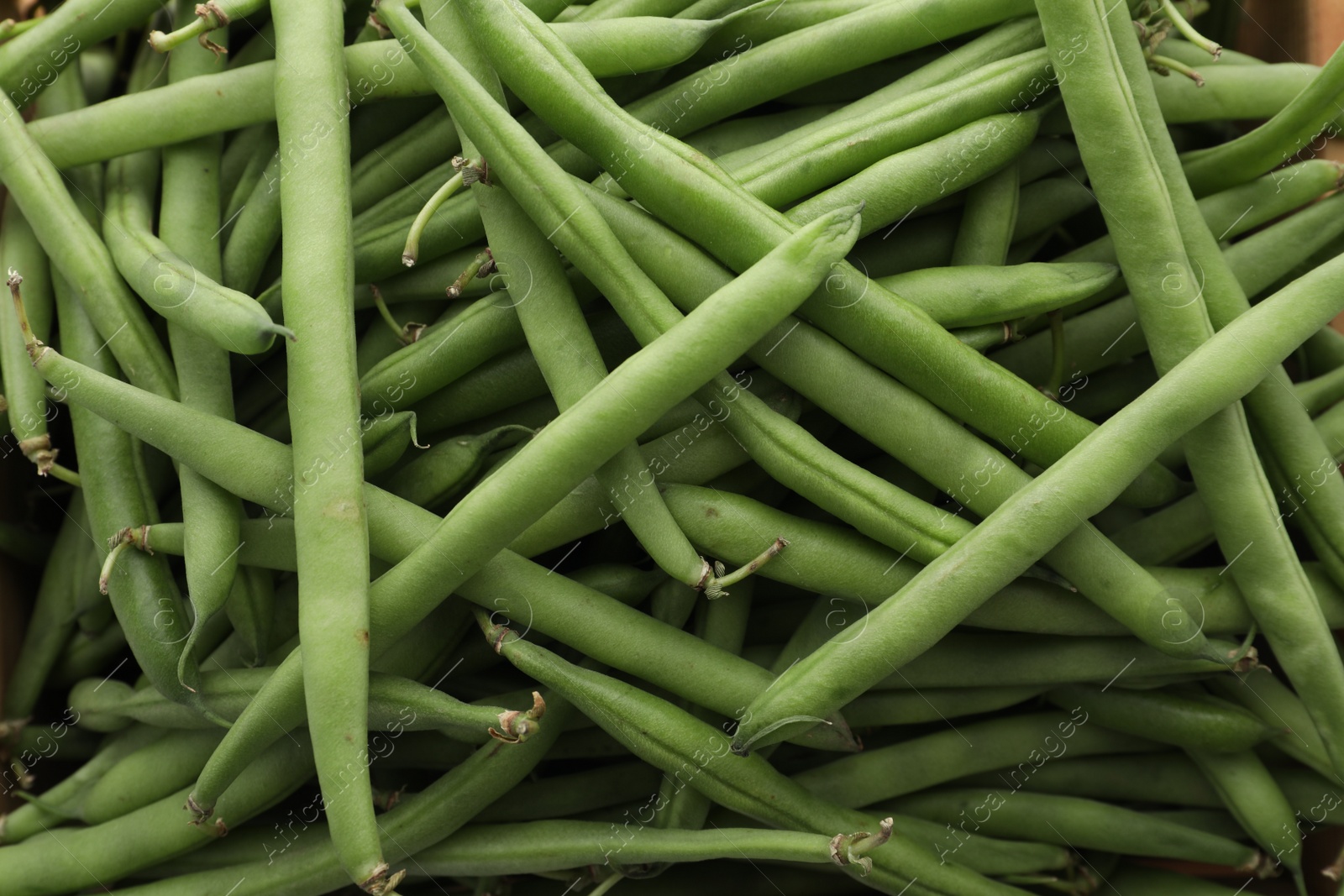 Photo of Many fresh green beans as background, closeup