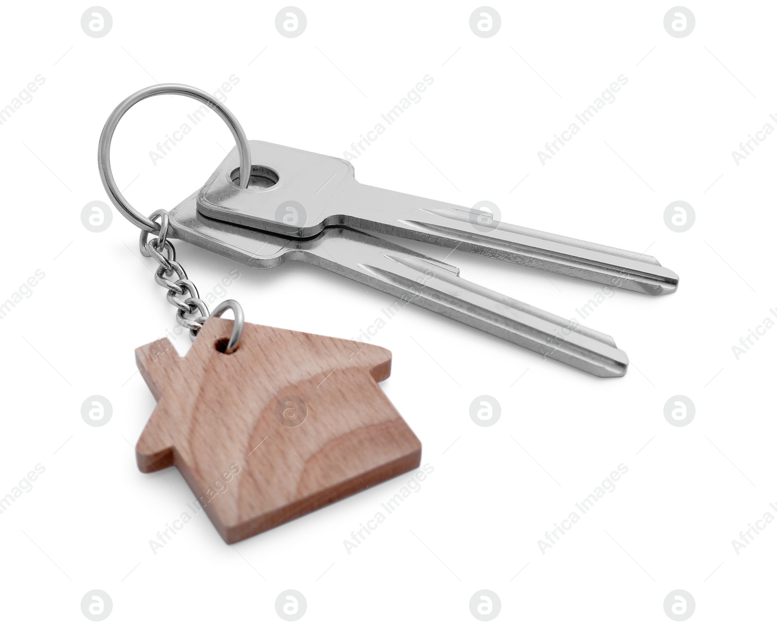 Photo of Key with keychain in shape of house isolated on white
